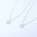 Load image into Gallery viewer, Two silver necklaces with round engravable pendants