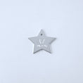 Load image into Gallery viewer, Silver star-shaped pendant with engraved child's drawing