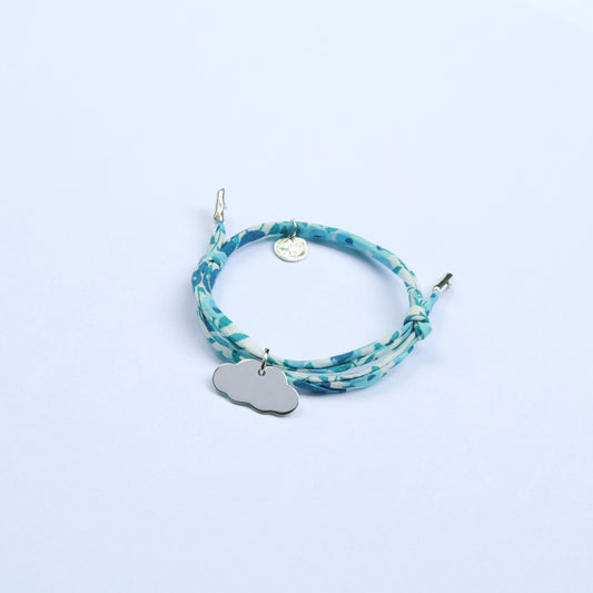 Personalised cord bracelet with floral pattern and silver cloud pendant