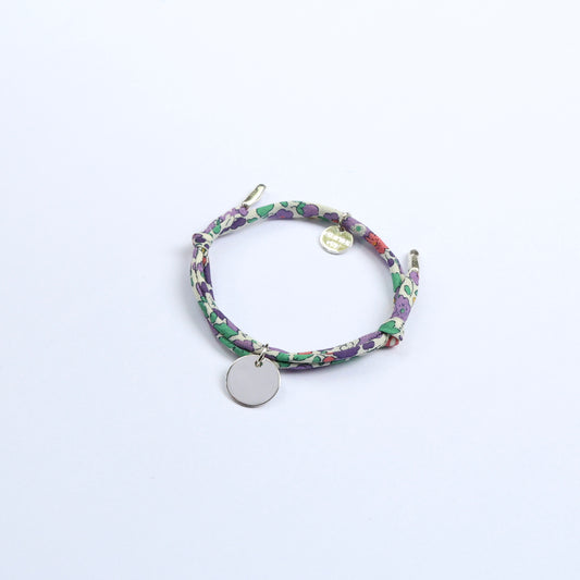 Floral patterned bracelet with a round pendant that can be personalised, perfect for children and babies