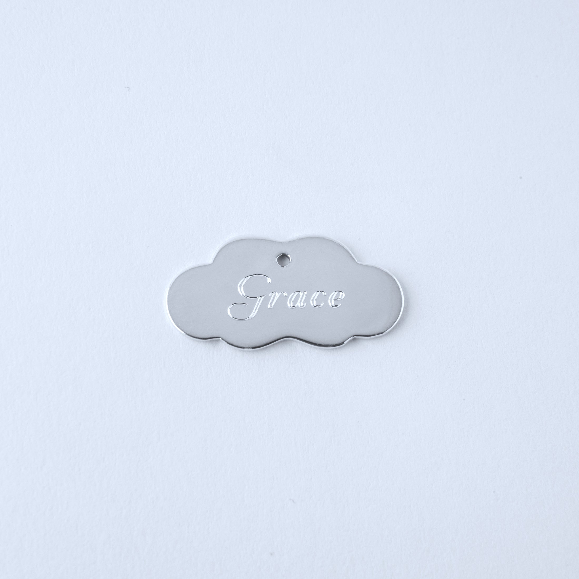 Silver cloud-shaped pendant with name engraved 