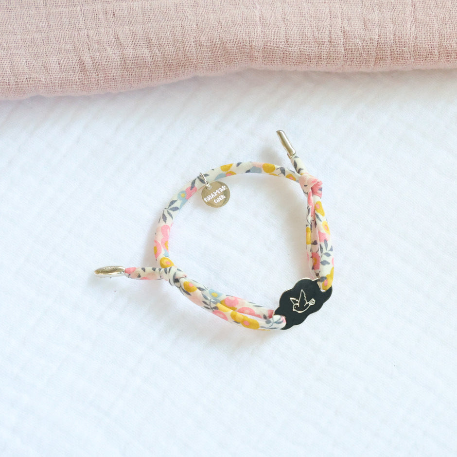 Girl bracelet with silver cloud pendant engraved with a bird