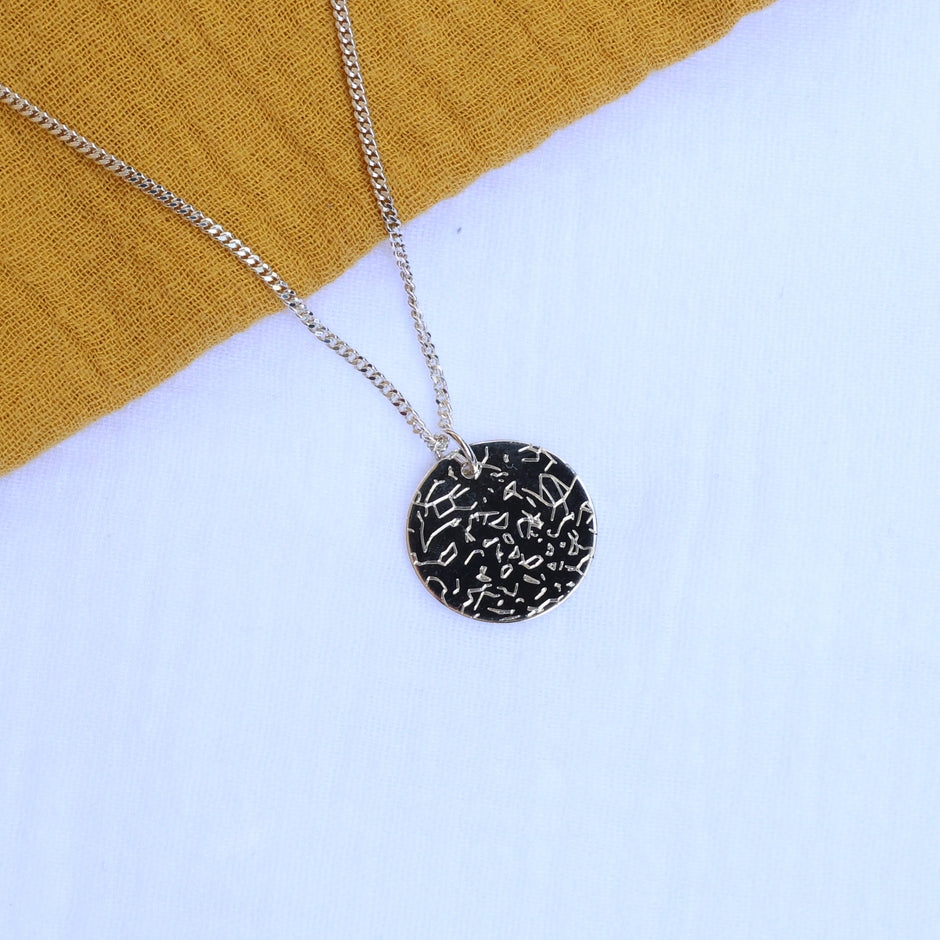 Silver necklace engraved with personalised night sky