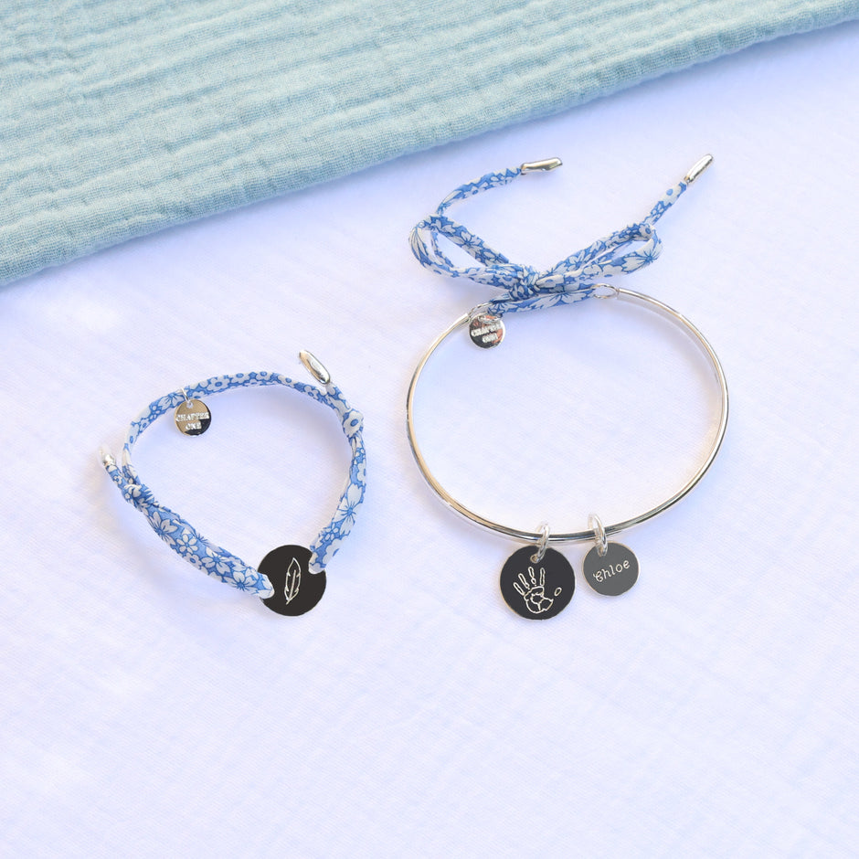 Sterling silver bracelets set for Mums and children, personalised with handprint engraving and name.