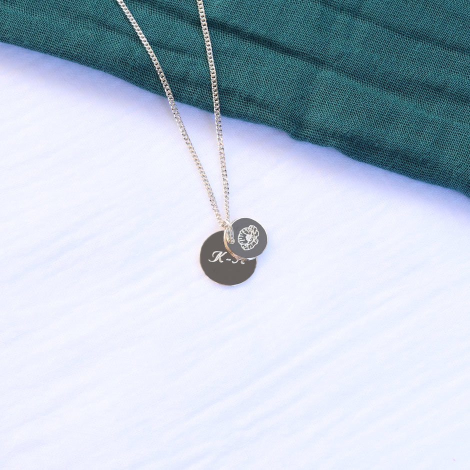 Silver necklace for women with two engraved round pendants 