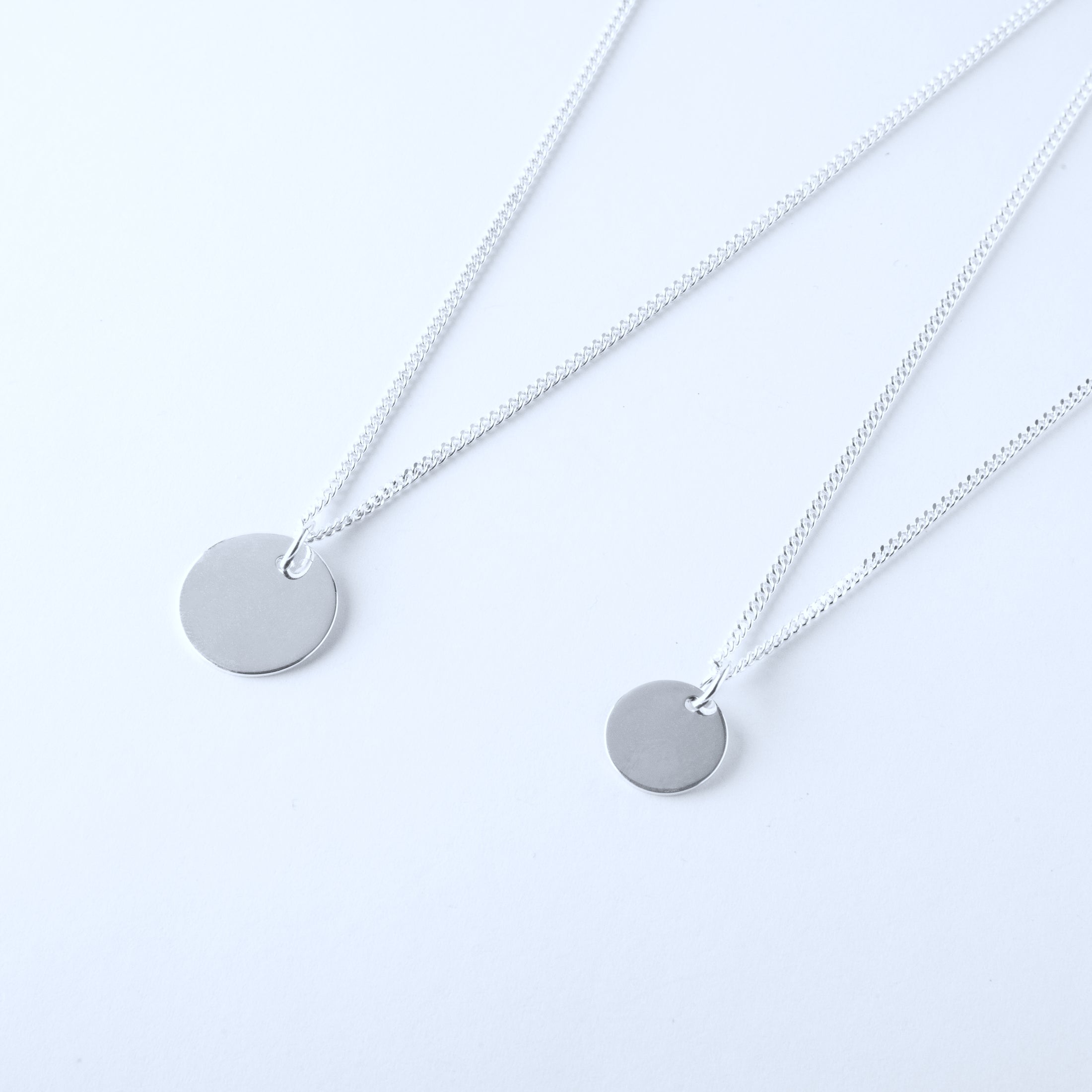 Mummy and me silver necklaces with round pendants 