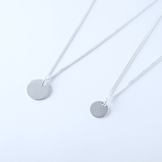 Mummy and me silver necklaces with round pendants 