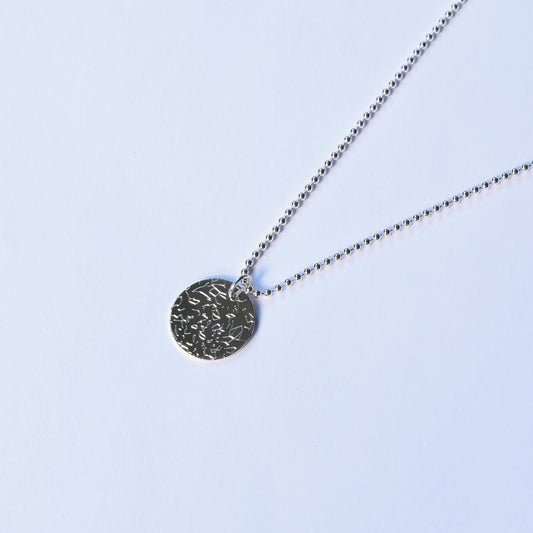 Silver Necklace with a round pendant engraved with custom night sky
