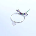 Load image into Gallery viewer, Silver bracelet with a star charm and a floral ribbon
